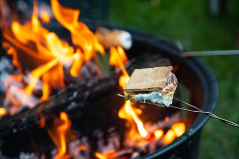 a piece of food is being cooked on a grill